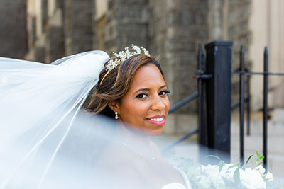 Bride smiling with large veil