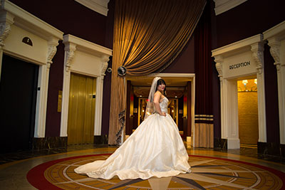 Bride at Kimpton Hotel Monaco Philadelphia’s main entrance