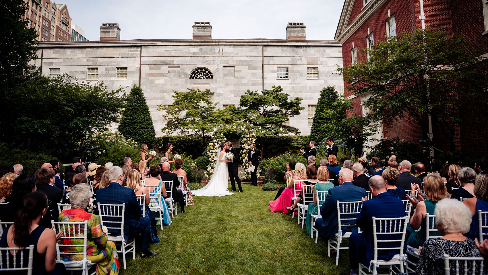 Bride & Groom kiss at Wedding Ceremony at Thomas Jefferson Garden