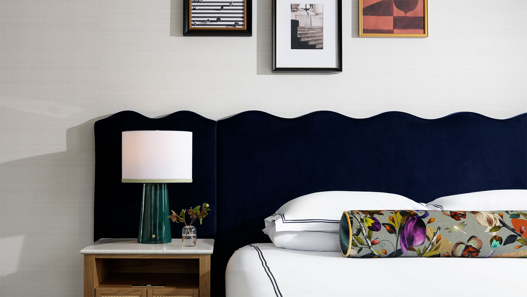 King bed and side table in standard king guestroom at Kimpton Hotel Monaco Philadelphia