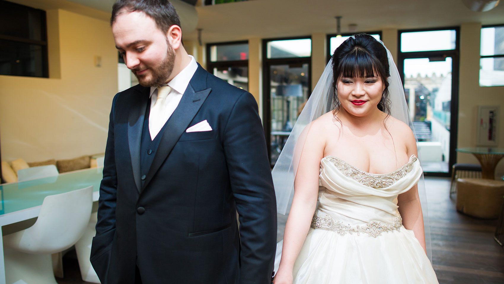 Bride and groom holding hands