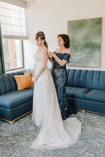 Bride and her mom getting ready