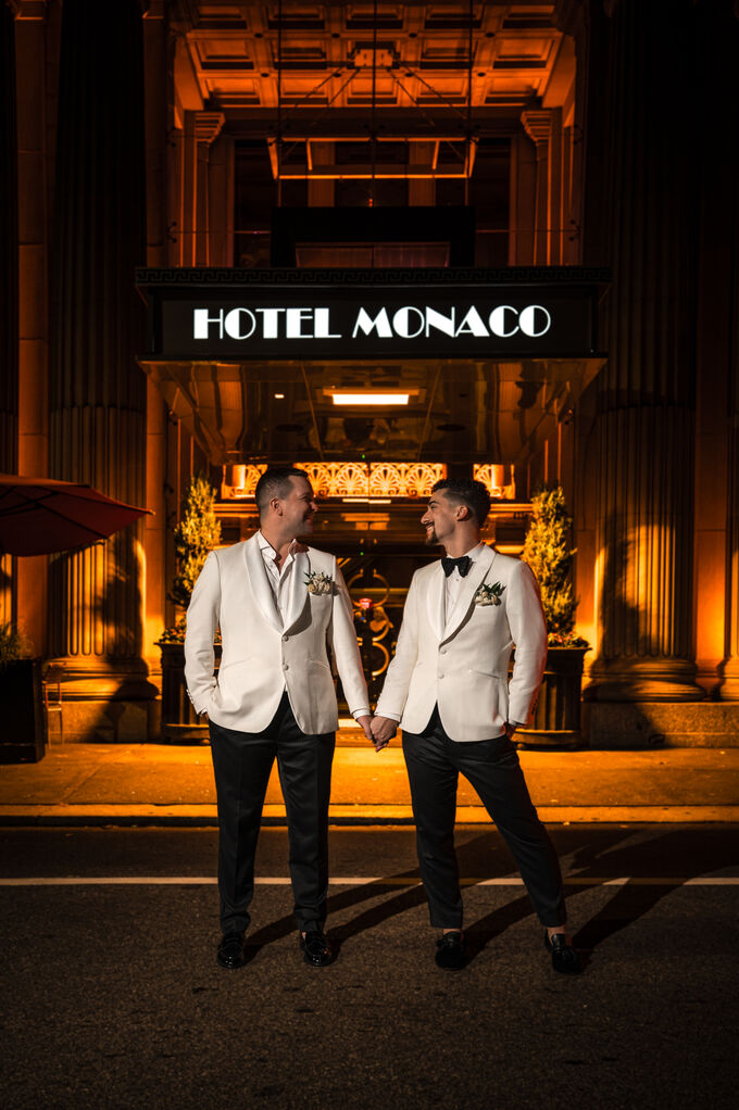 Grooms outside the Hotel Monaco Philadelphia entrance