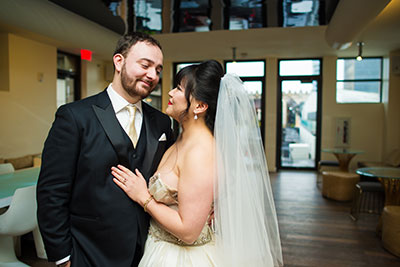 Bride and groom looking at one another