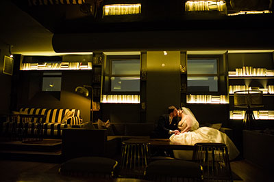 Bride and groom embracing at Kimpton Hotel Monaco Philadelphia 